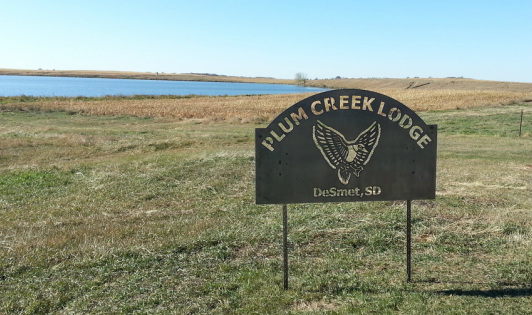 Plum Creek Lodge sign